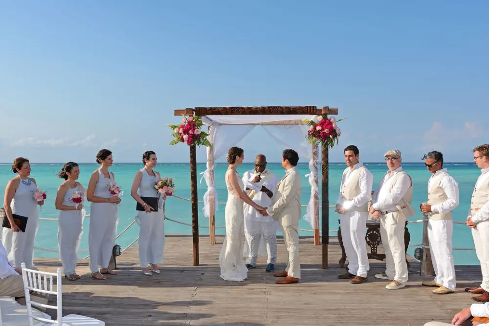 Luxury beach engagement at Essque Zalu Zanzibar Tanzania with romantic ocean sunset view