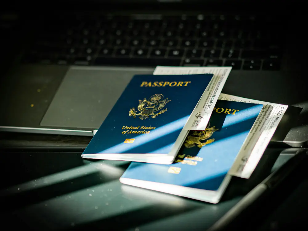 Passport with printed Tanzania eVisa approval ready for travel