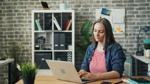 Woman completing a Tanzania eVisa application online before her trip